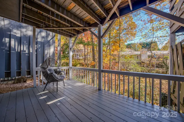 a view of chairs on wooden deck