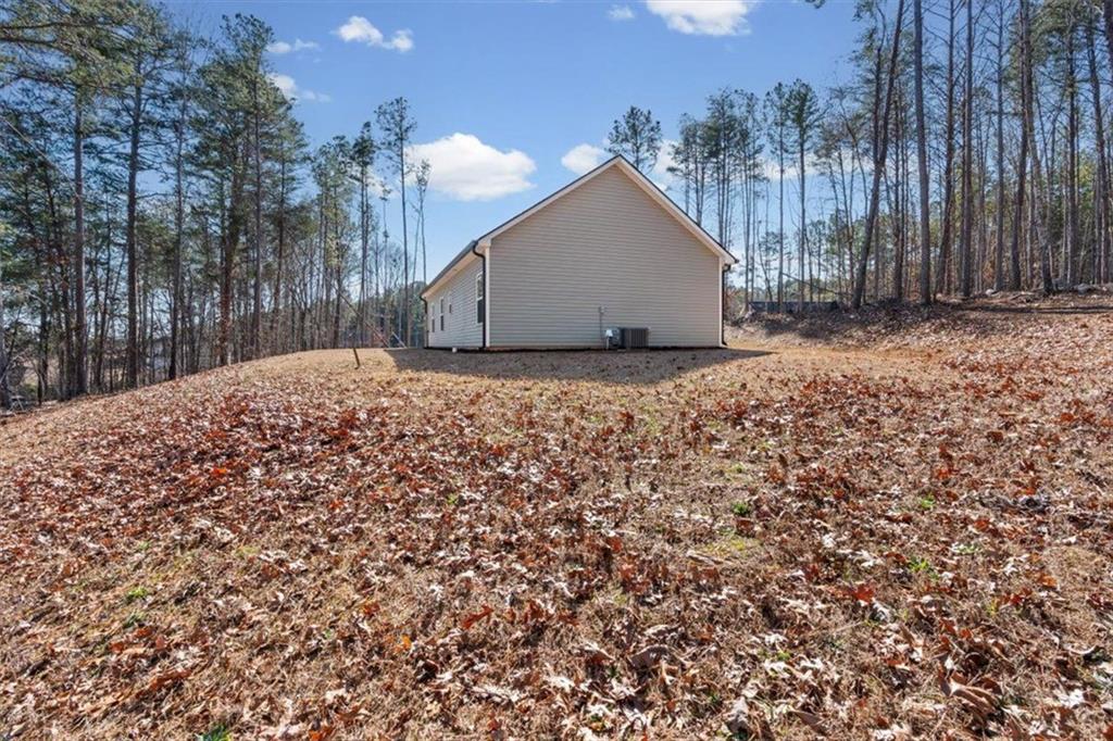 2522 Honeysuckle Lane Temple, GA 30179 - Photo 33 of 43 a backyard of a house