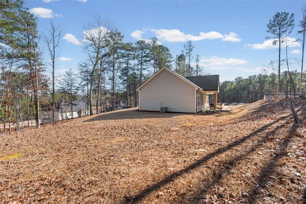 2522 Honeysuckle Lane Temple, GA 30179 - Photo 35 of 43 a view of a backyard of the house