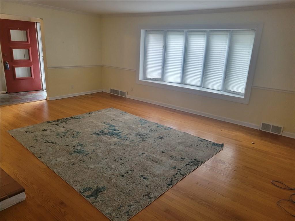 1260 Fox Chapel Road Pittsburgh, PA 15238 - Photo 15 of 29 an empty room with wooden floor