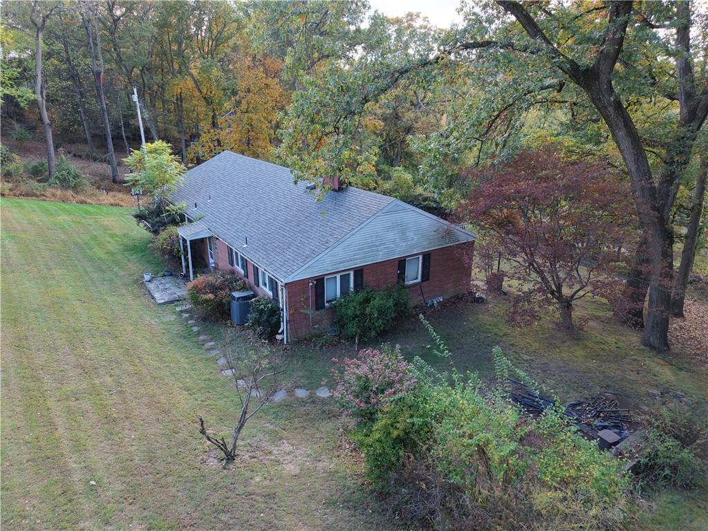 1260 Fox Chapel Road Pittsburgh, PA 15238 - Photo 24 of 29 a view of a house with a yard siting area and garden