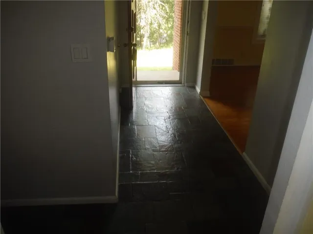 a view of hallway with shower