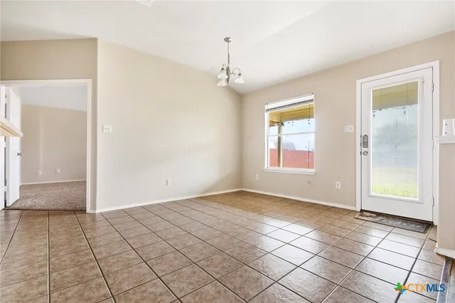 a view of an empty room with window