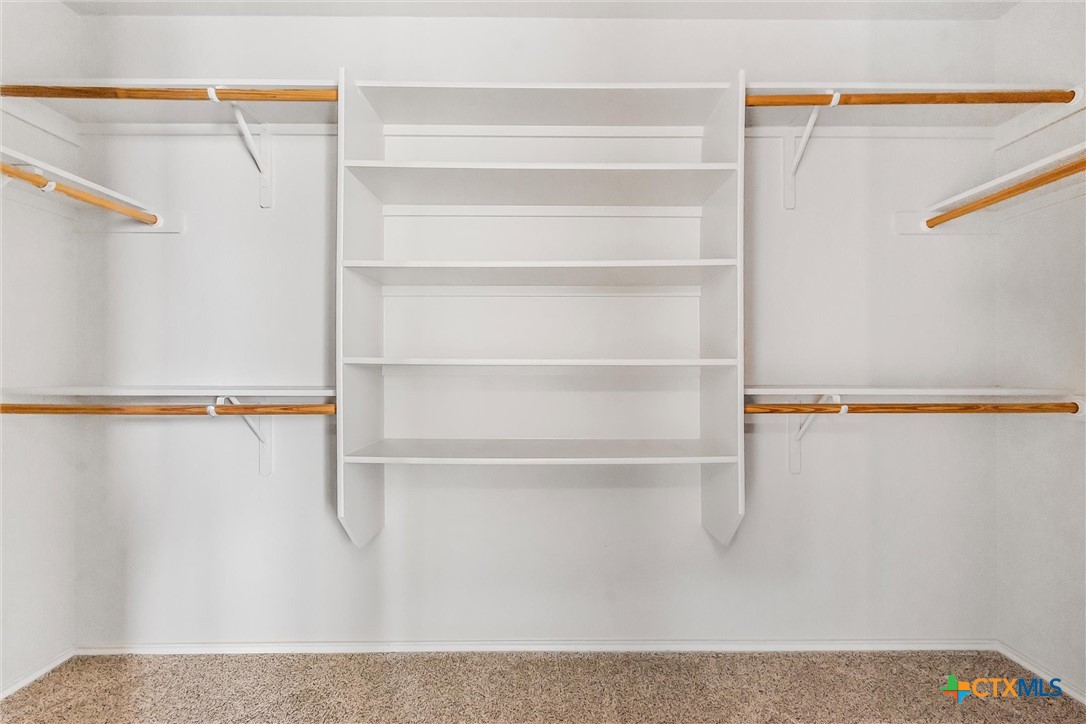 200 Memory Lane Harker Heights, TX 76548 - Photo 16 of 27 a view of walk in closet with empty racks