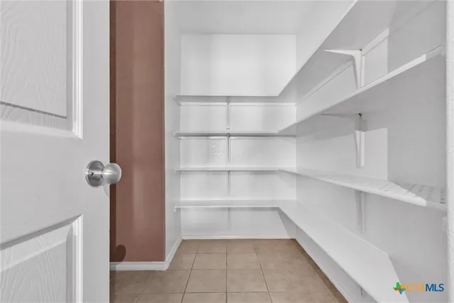 a view of a room with shelves