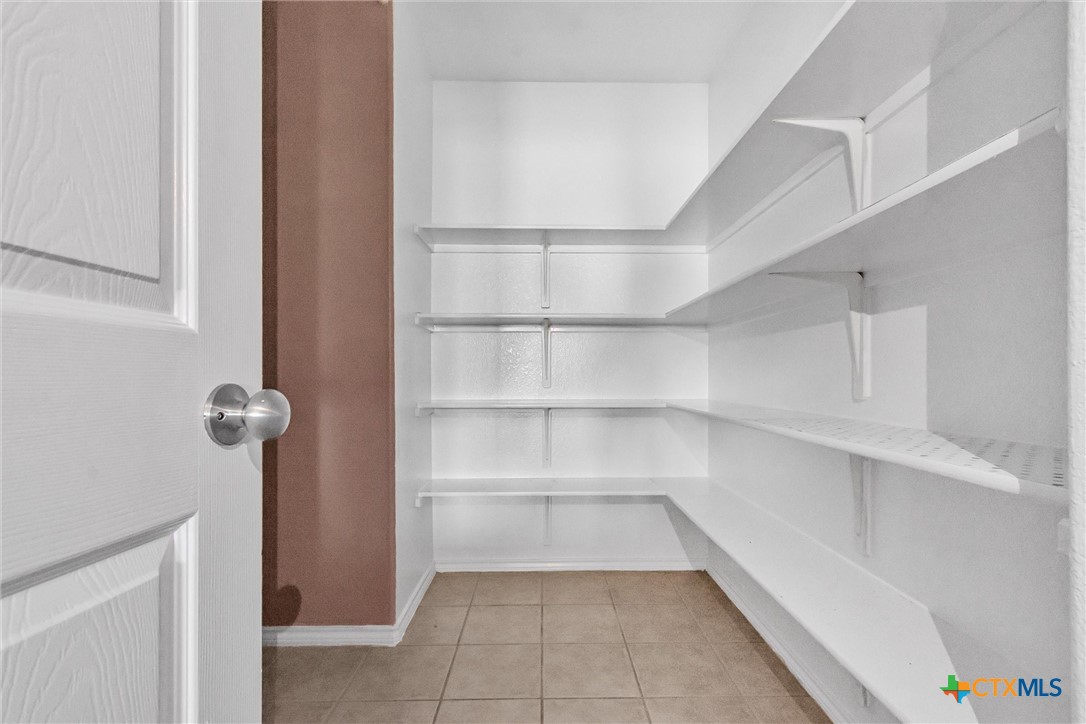 200 Memory Lane Harker Heights, TX 76548 - Photo 19 of 27 a view of a room with shelves