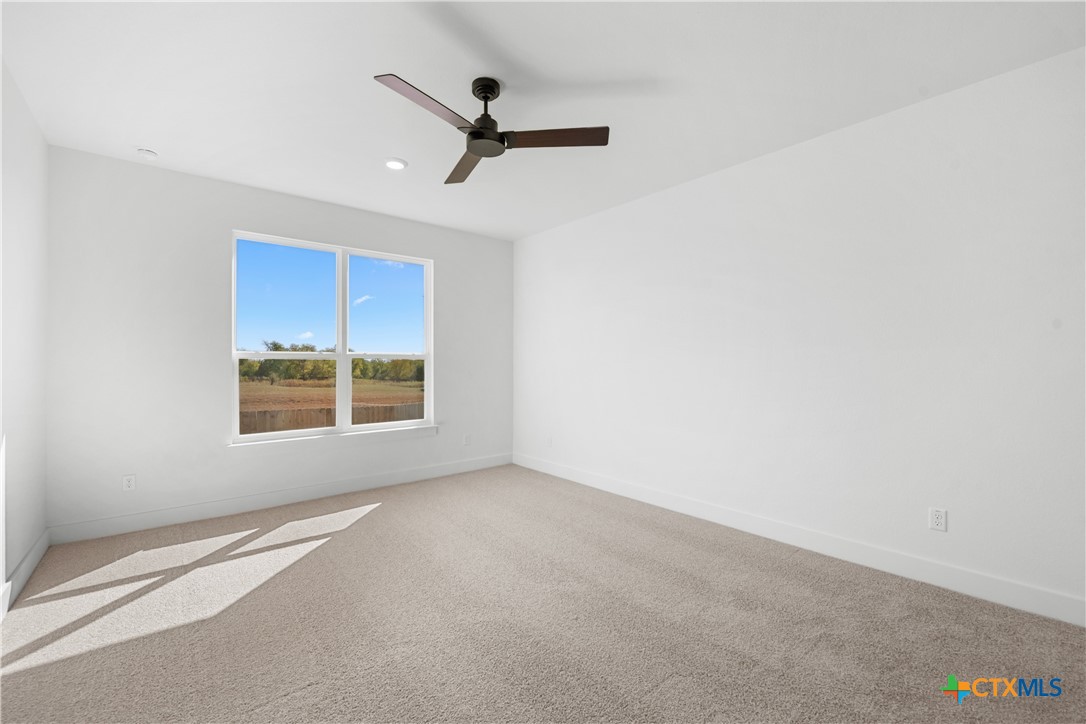 1807 Bear Grass Rdg Road Temple, TX 76501 - Photo 5 of 16 a view of an empty room with a window