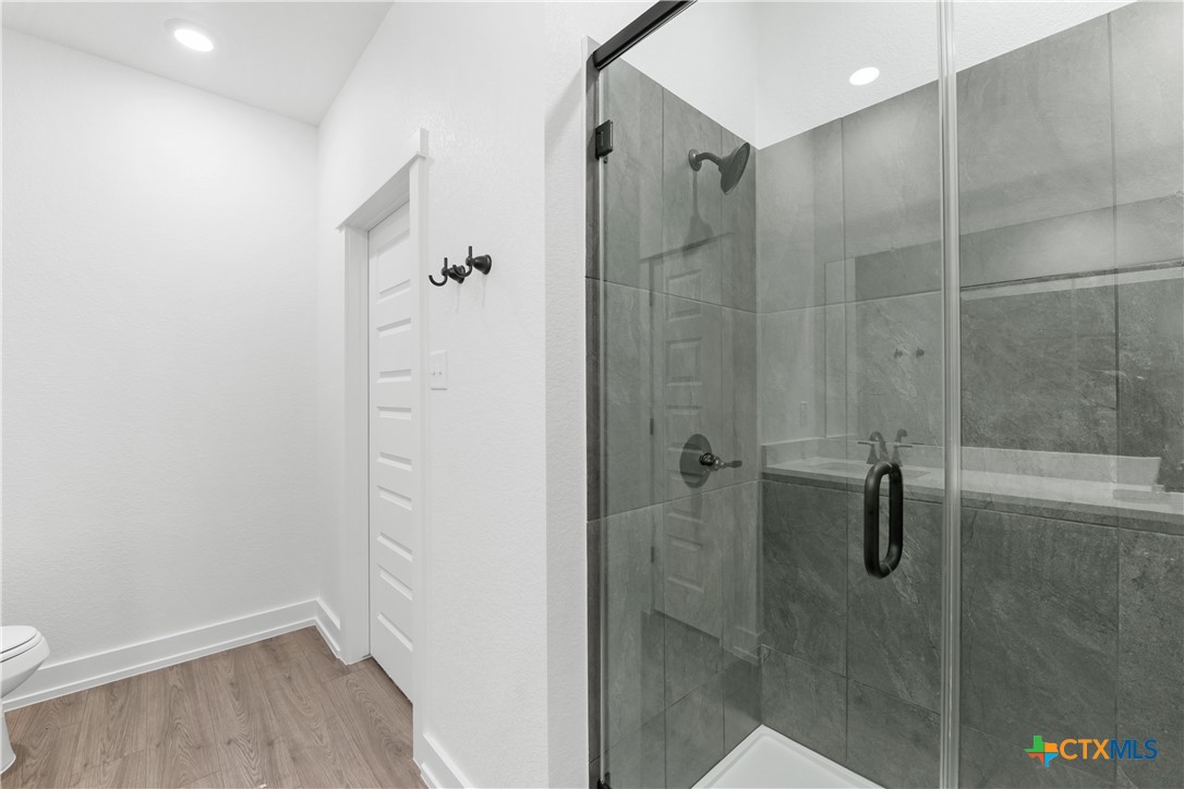 1807 Bear Grass Rdg Road Temple, TX 76501 - Photo 7 of 16 a bathroom with a shower