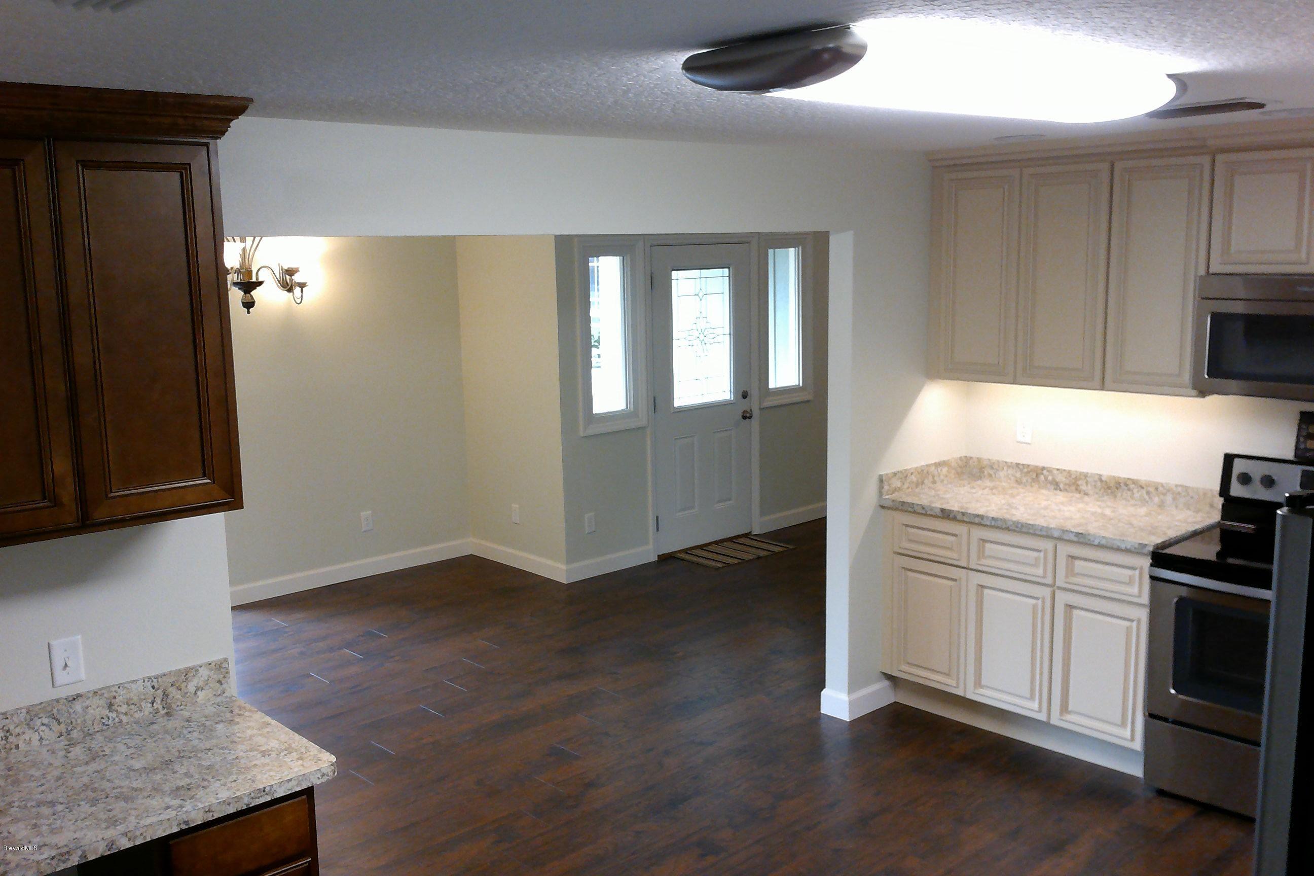 7401 Ester Road Cocoa, FL 32927 - Photo 14 of 41 View of kitchen from back door