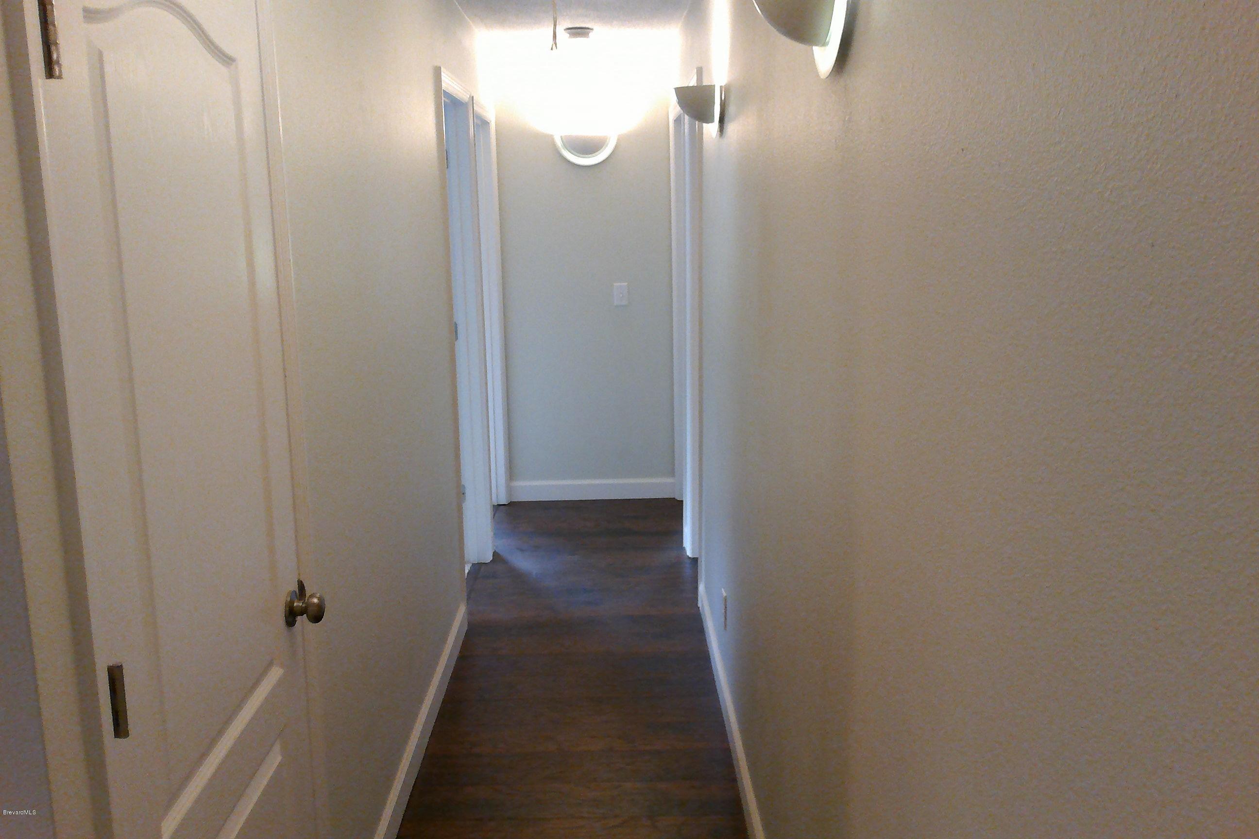 7401 Ester Road Cocoa, FL 32927 - Photo 19 of 41 Hallway to bedrooms