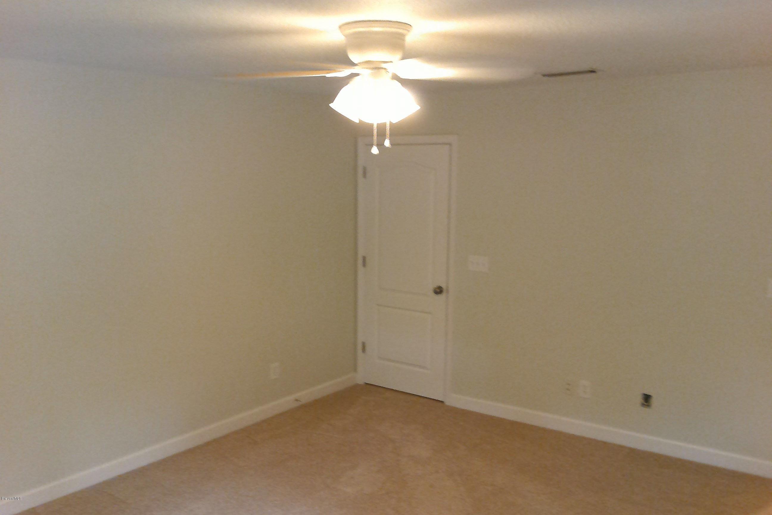 7401 Ester Road Cocoa, FL 32927 - Photo 21 of 41 Additional shot of master bedroom