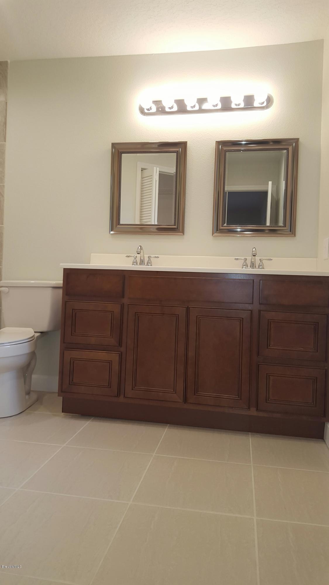 7401 Ester Road Cocoa, FL 32927 - Photo 23 of 41 Entrance in to master bathroom