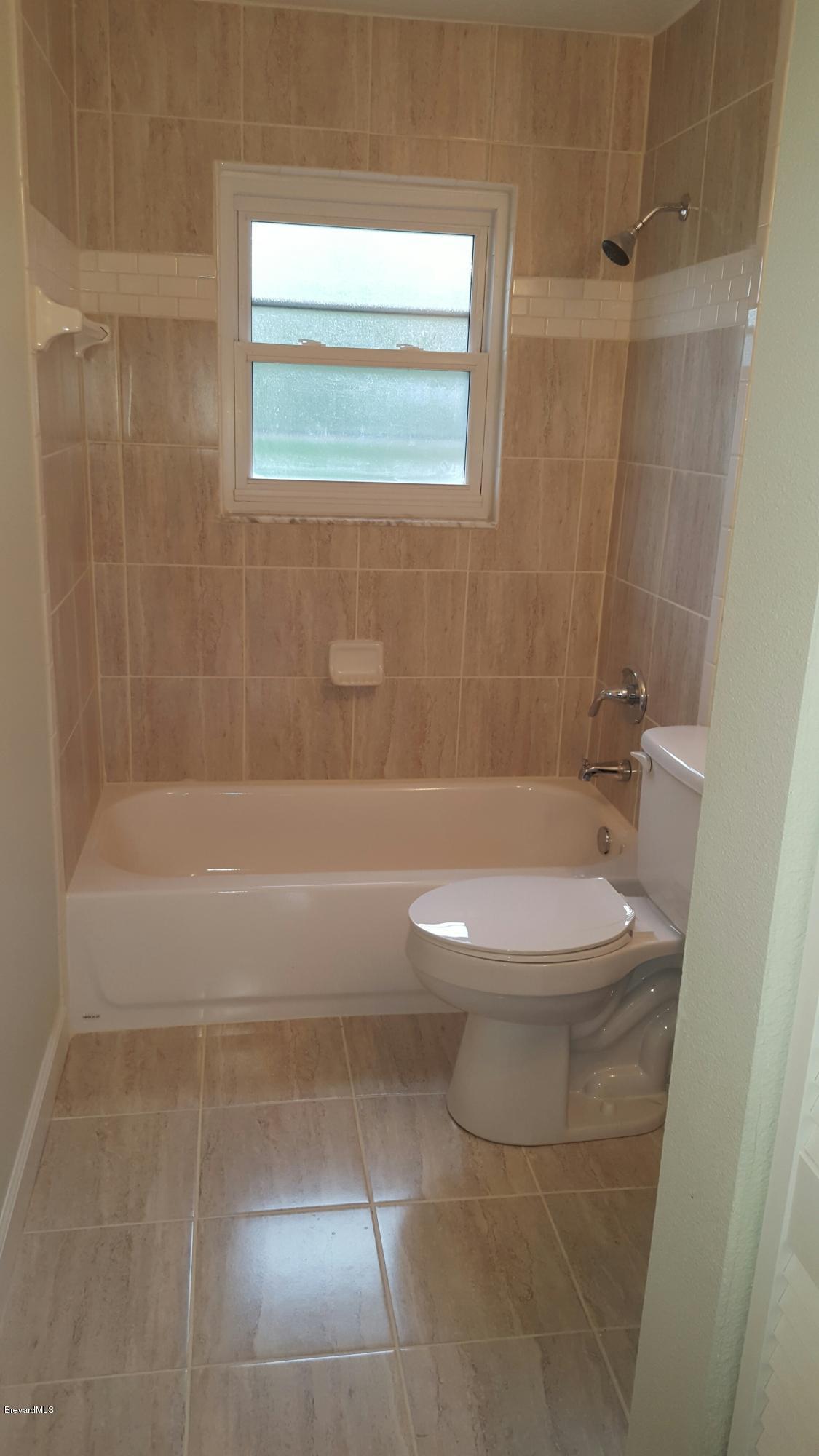 7401 Ester Road Cocoa, FL 32927 - Photo 36 of 41 Entrance to guest bathroom