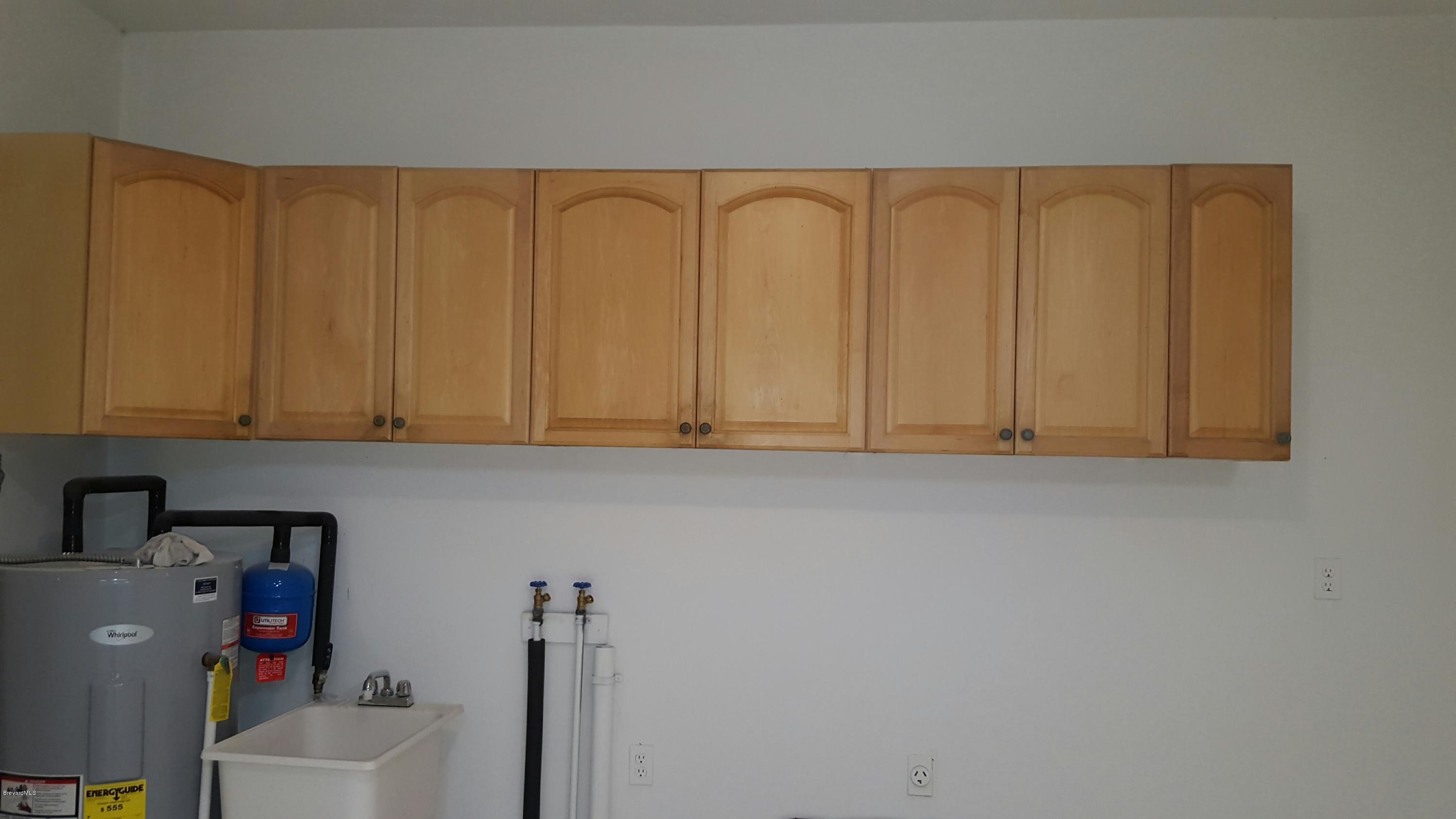 7401 Ester Road Cocoa, FL 32927 - Photo 41 of 41 Storage above washer/dryer hookup