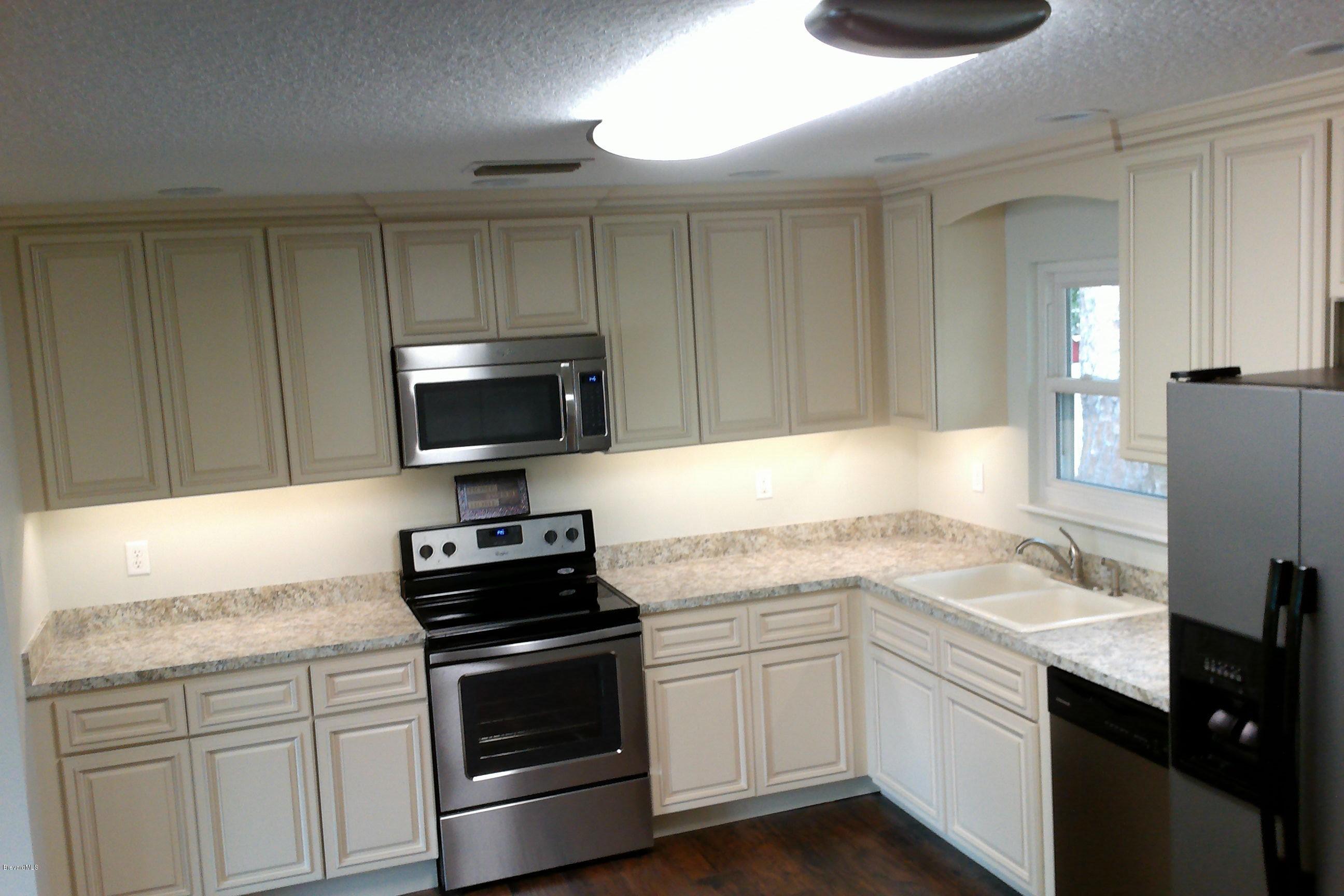 7401 Ester Road Cocoa, FL 32927 - Photo 9 of 41 Custom built cabinets
