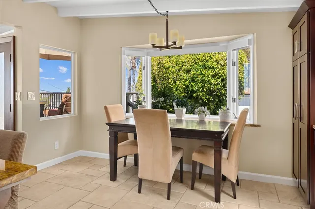 a bedroom with furniture and a fireplace