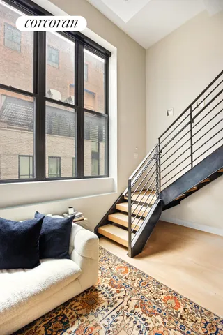 a bathroom with a toilet and a sink