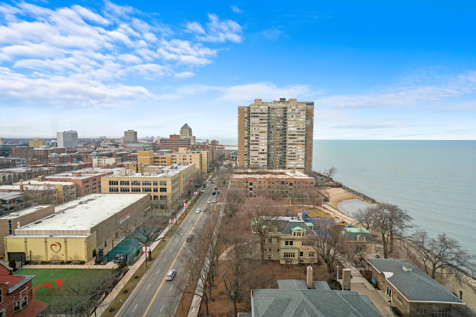 6171 North Sheridan Road, Unit 1401 Chicago, IL 60660 - Photo 16 of 29 a view of a city with tall buildings