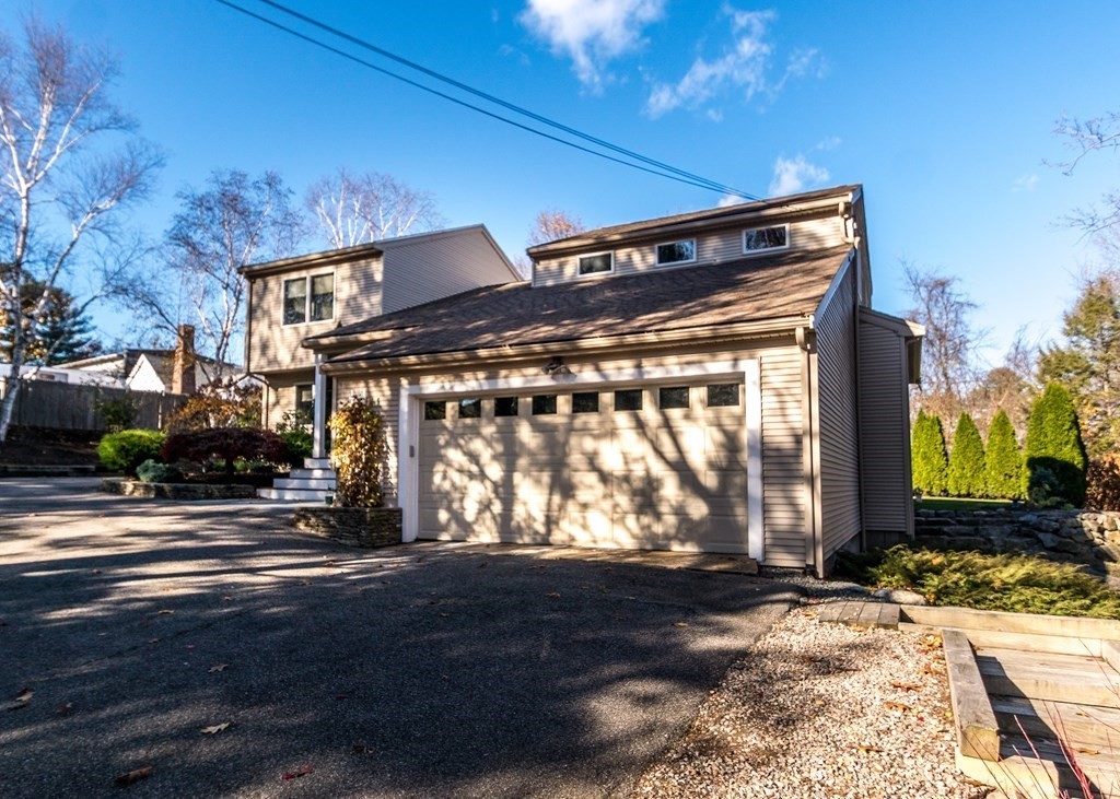 60 Pershing Road Needham, MA 02494 - Photo 30 of 30 a front view of a house with a yard