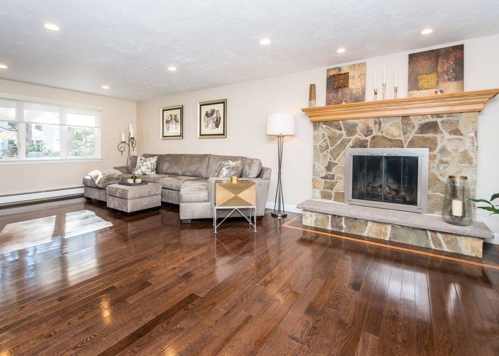 60 Pershing Road Needham, MA 02494 - Photo 3 of 30 a living room with furniture and a fireplace
