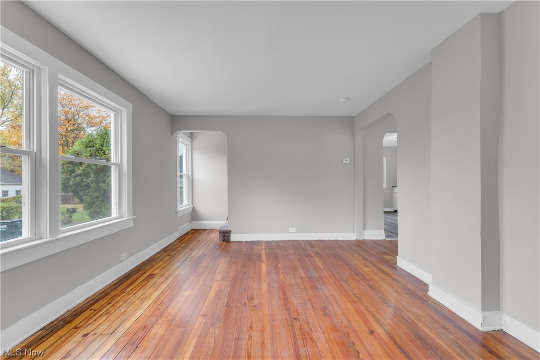 6184 Turney Road Cleveland, OH 44125 - Photo 9 of 28 Spare room with plenty of natural light and light hardwood / wood-style floors