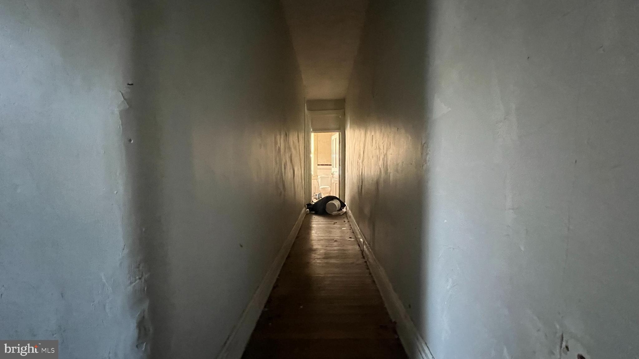 1241 Perry Street Northeast Washington, DC 20017 - Photo 14 of 19 a view of a hallway with wooden shelves