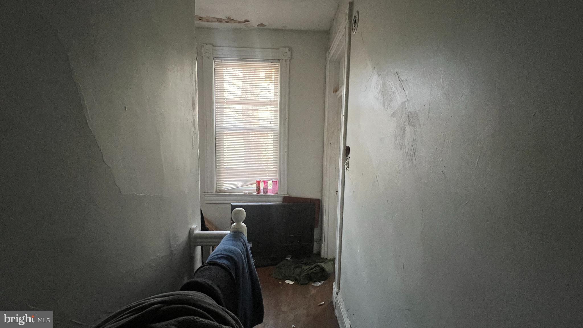 1241 Perry Street Northeast Washington, DC 20017 - Photo 15 of 19 a room with a chair and a window