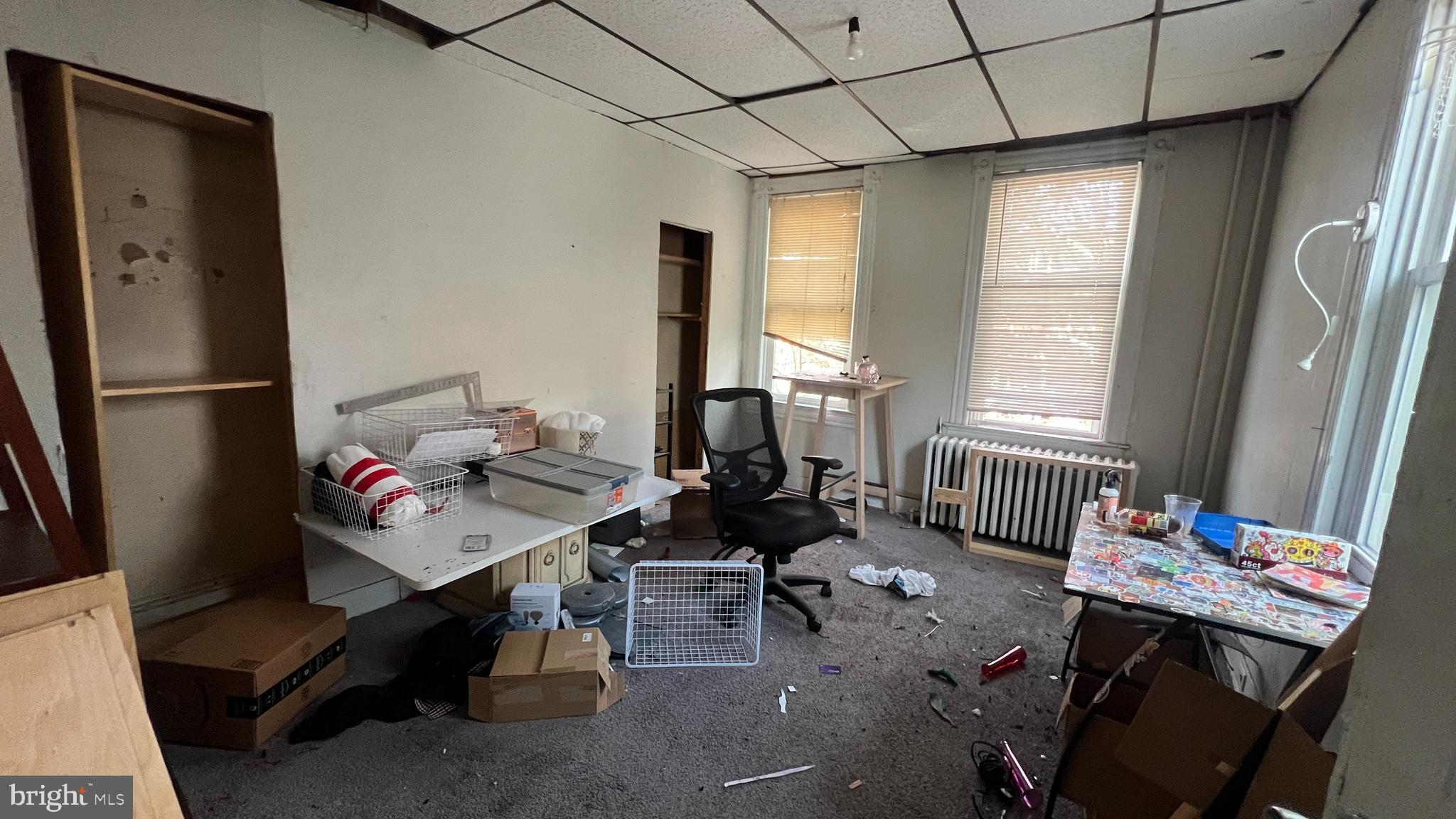 1241 Perry Street Northeast Washington, DC 20017 - Photo 19 of 19 a living room with furniture and a window