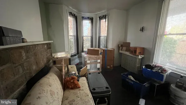 a room with furniture and window