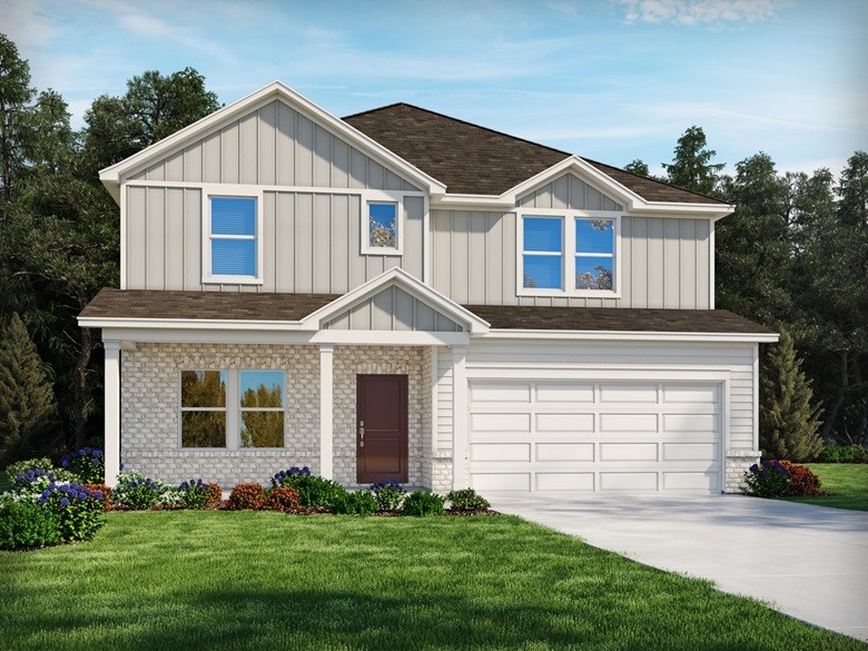 1104 Holland Ridge Way Lebanon, TN 37090 - Photo 1 of 26 a front view of a house with a garden and plants