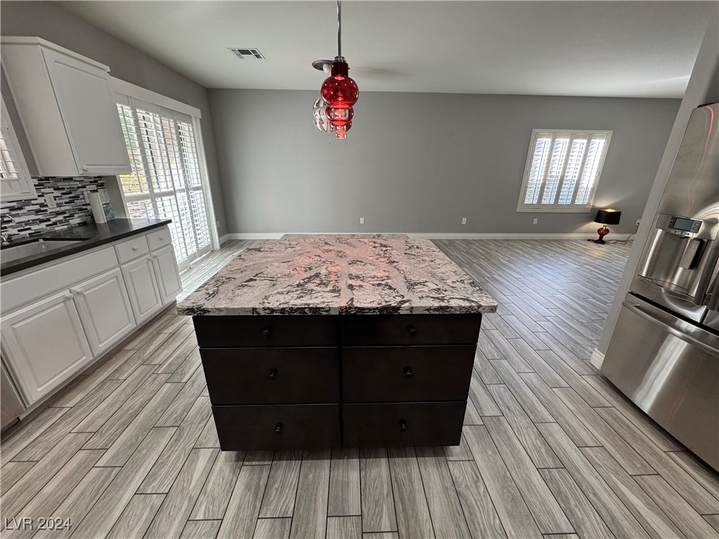 3025 Fort Stanwix Road Henderson, NV 89052 - Photo 9 of 45 Two Tone Cabinetry and Quartz Counter Tops