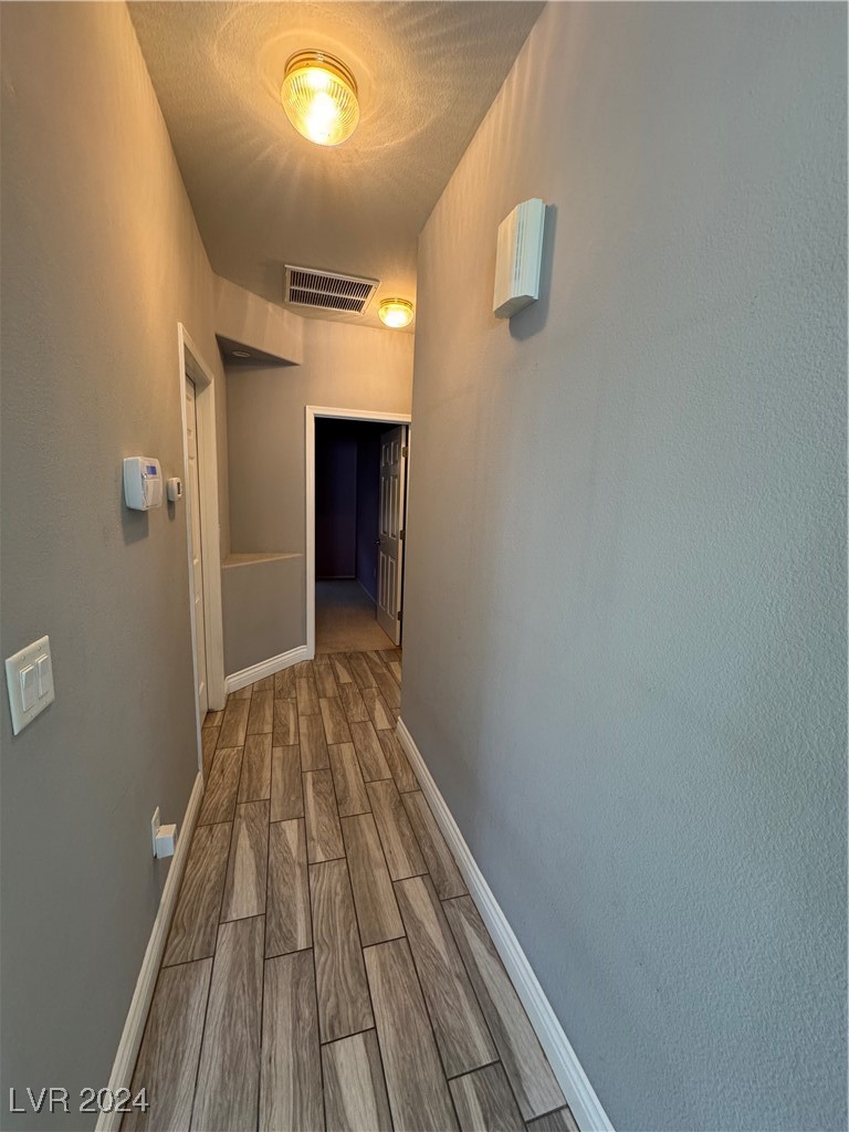 3025 Fort Stanwix Road Henderson, NV 89052 - Photo 13 of 45 Tile Flooring Hall leading to bedrooms
