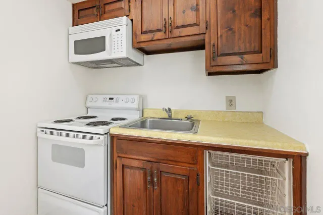 a view of walk in closet with window