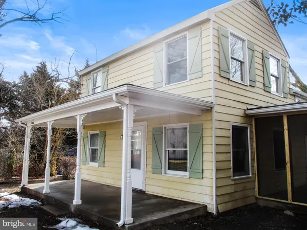 a kitchen with a sink stove and microwave
