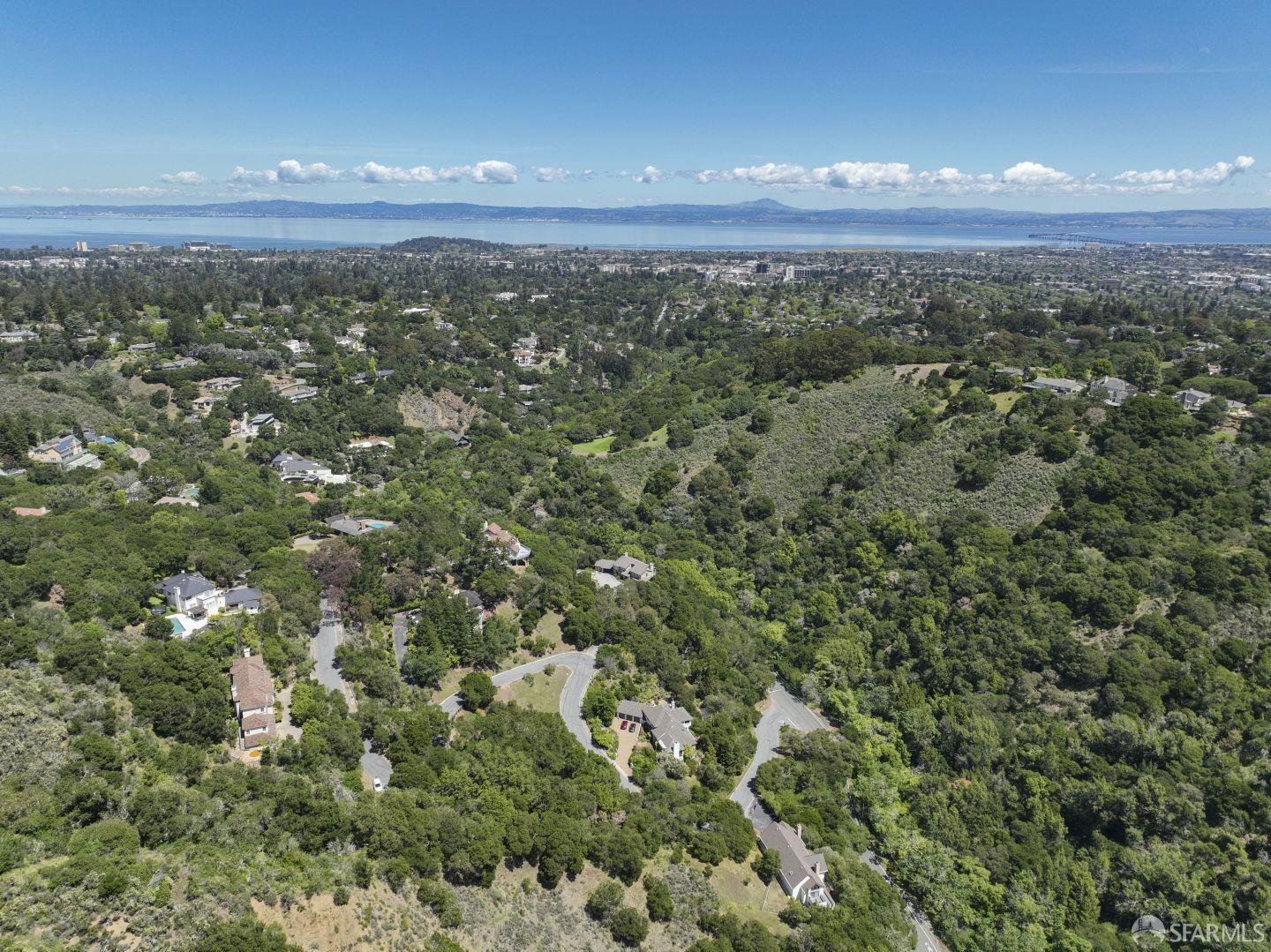 0 Woodridge Road Hillsborough, CA 94010 - Photo 1 of 17 a view of a city and green field