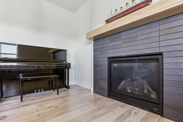 a large kitchen with stainless steel appliances granite countertop a stove and cabinets