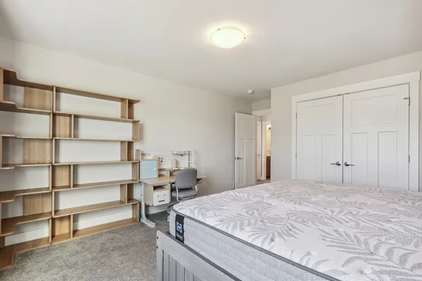 a view of a hallway with windows