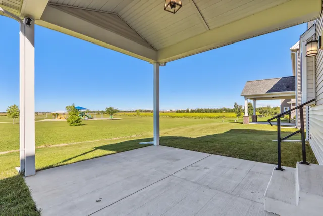 a view of a city with lots of residential buildings ocean and mountain view