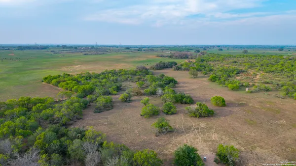 a view of a lake with a city