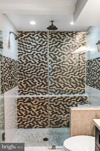 a view of a hallway with washer and dryer