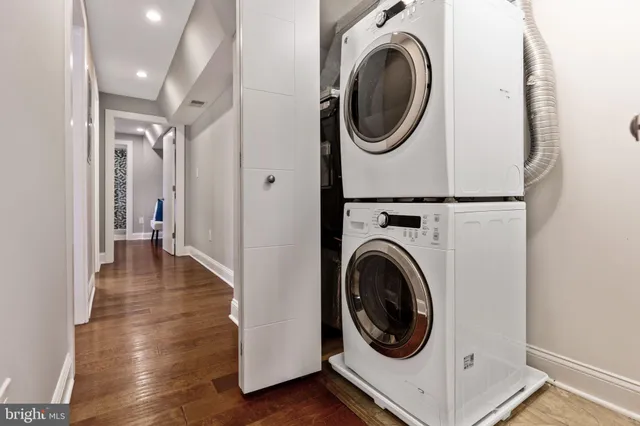 a view of balcony with wooden floor and windows