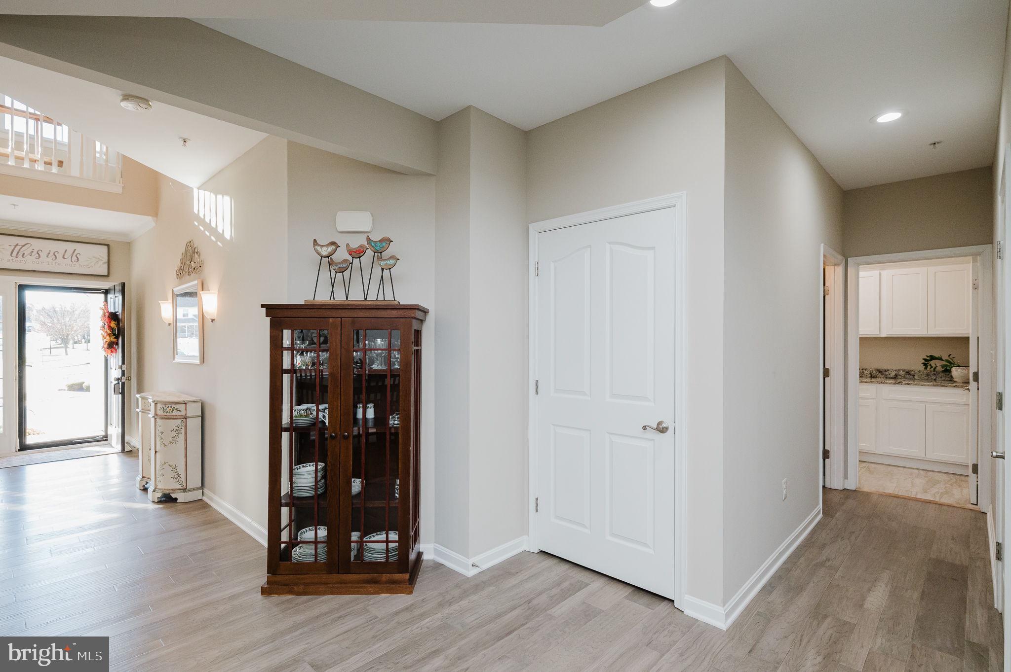 823 Bridle Path Bel Air, MD 21014 - Photo 12 of 66 a view of a hallway with wooden floor and closet