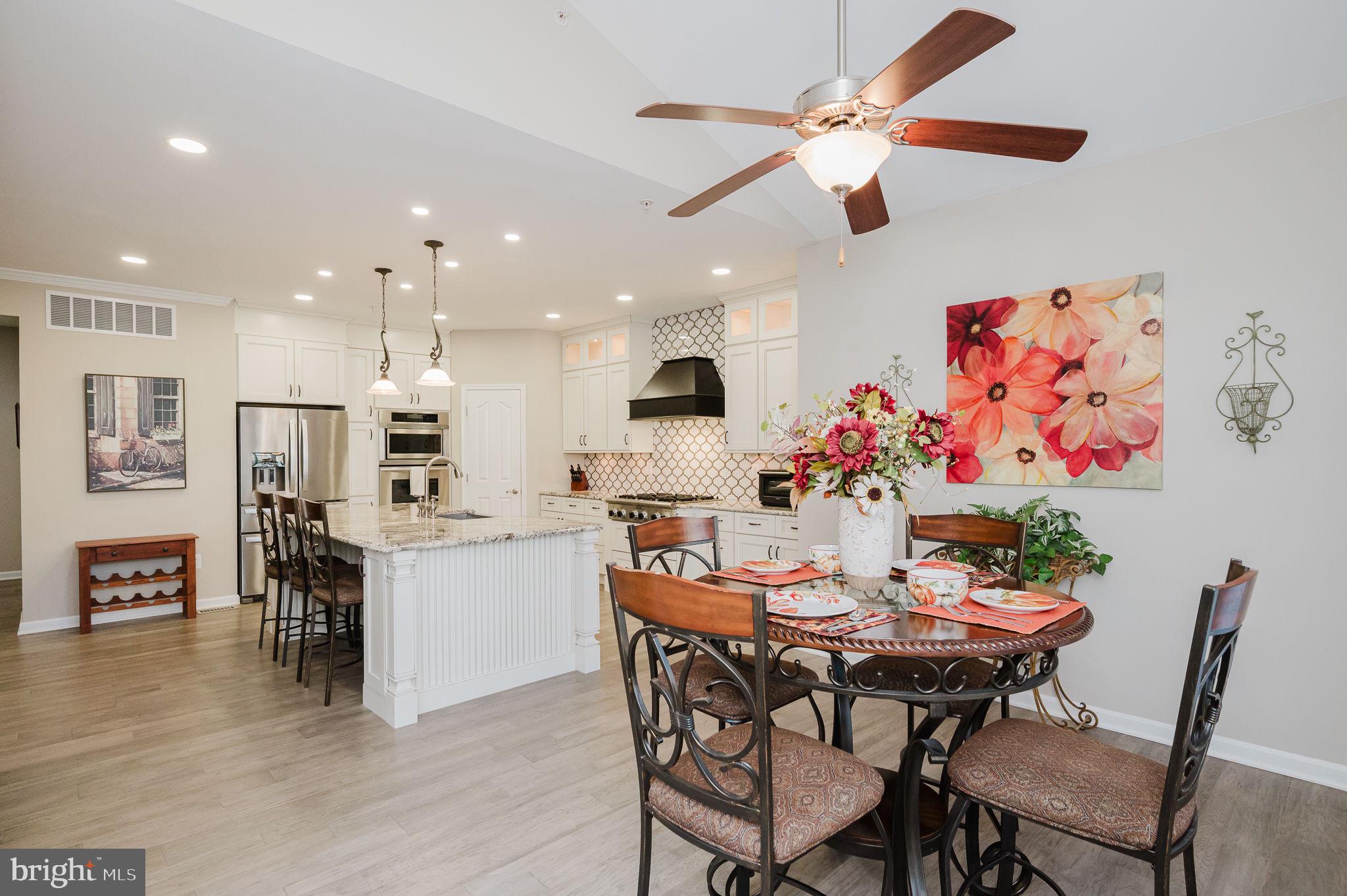 823 Bridle Path Bel Air, MD 21014 - Photo 25 of 66 a view of a dining room with furniture and wooden floor