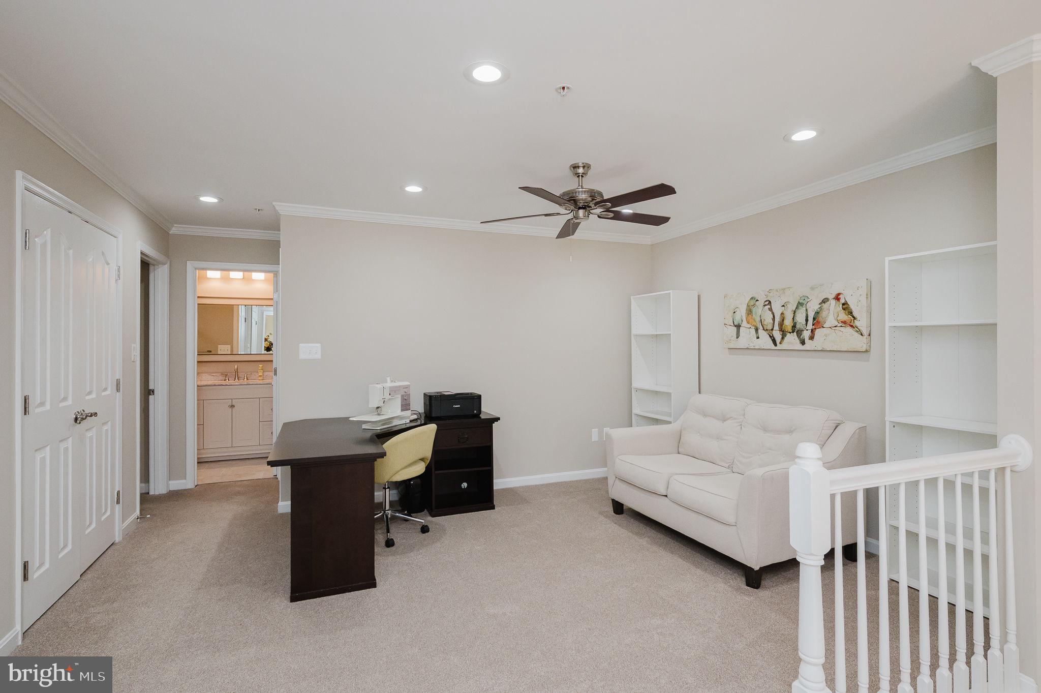 823 Bridle Path Bel Air, MD 21014 - Photo 28 of 66 a view of a livingroom with furniture and a ceiling fan