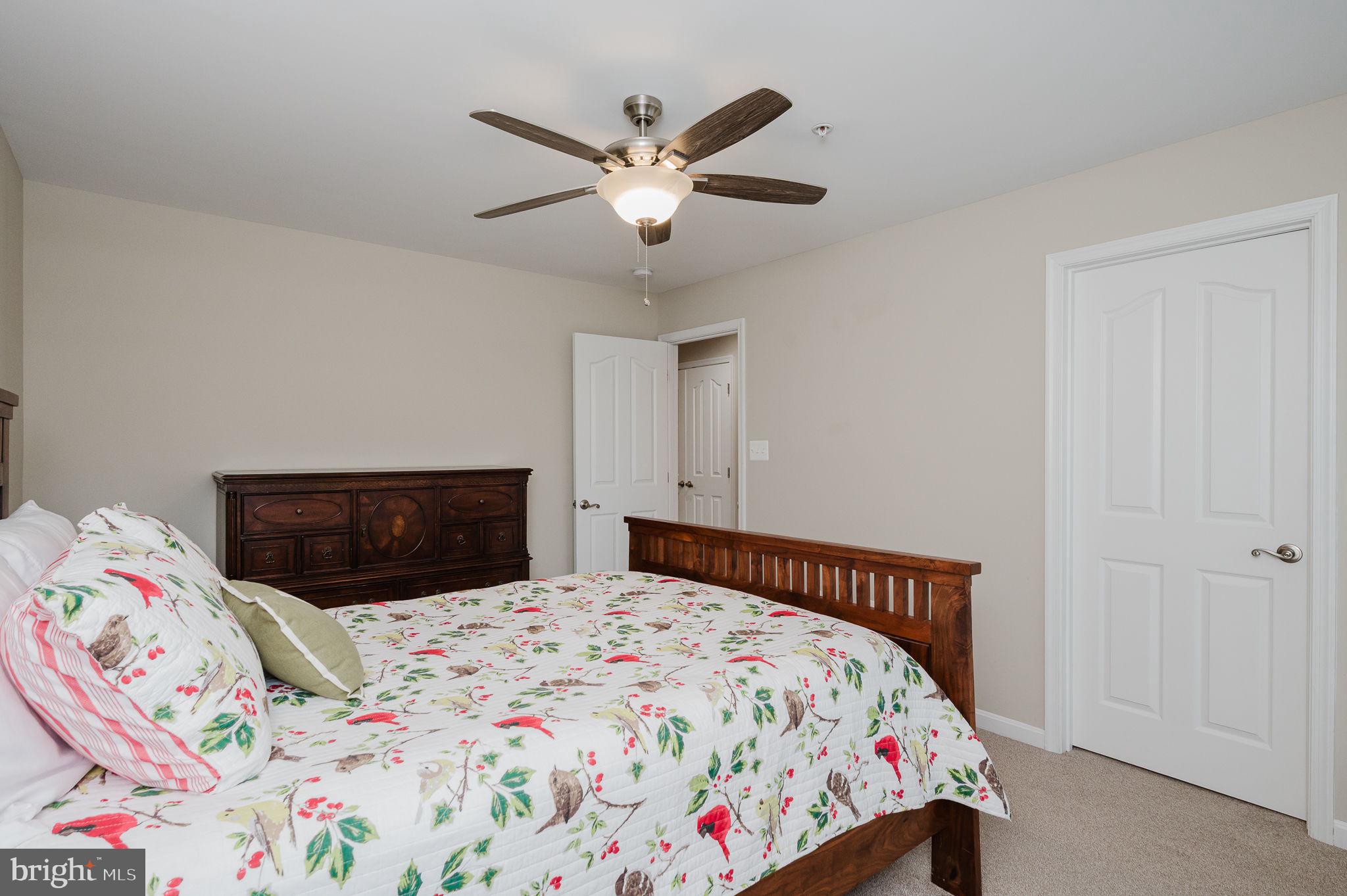 823 Bridle Path Bel Air, MD 21014 - Photo 43 of 66 a bedroom with a bed and a dresser