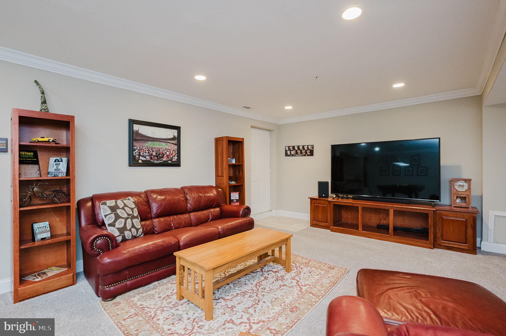 823 Bridle Path Bel Air, MD 21014 - Photo 50 of 66 a living room with furniture and a flat screen tv