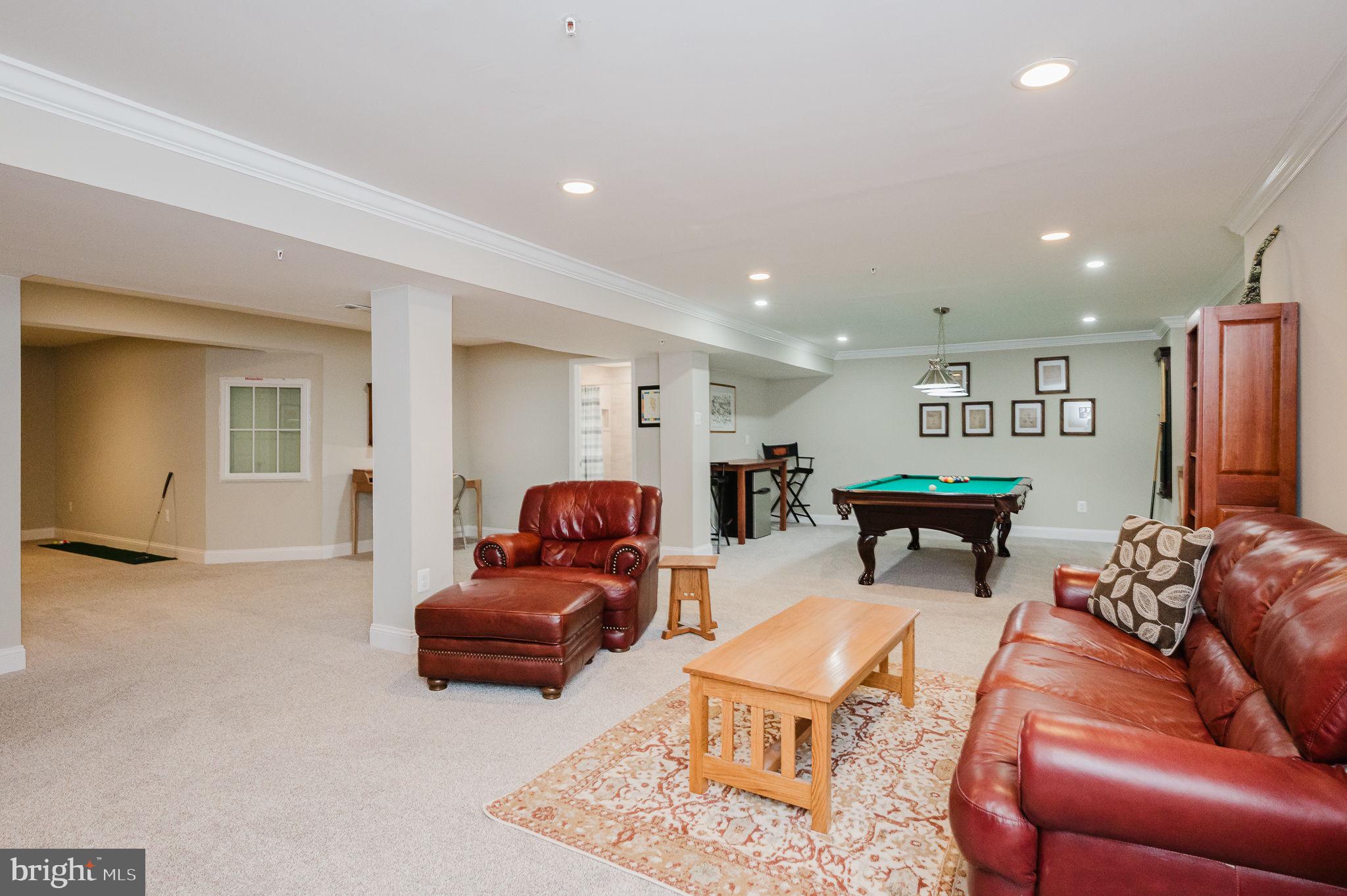 823 Bridle Path Bel Air, MD 21014 - Photo 52 of 66 a living room with furniture and a flat screen tv