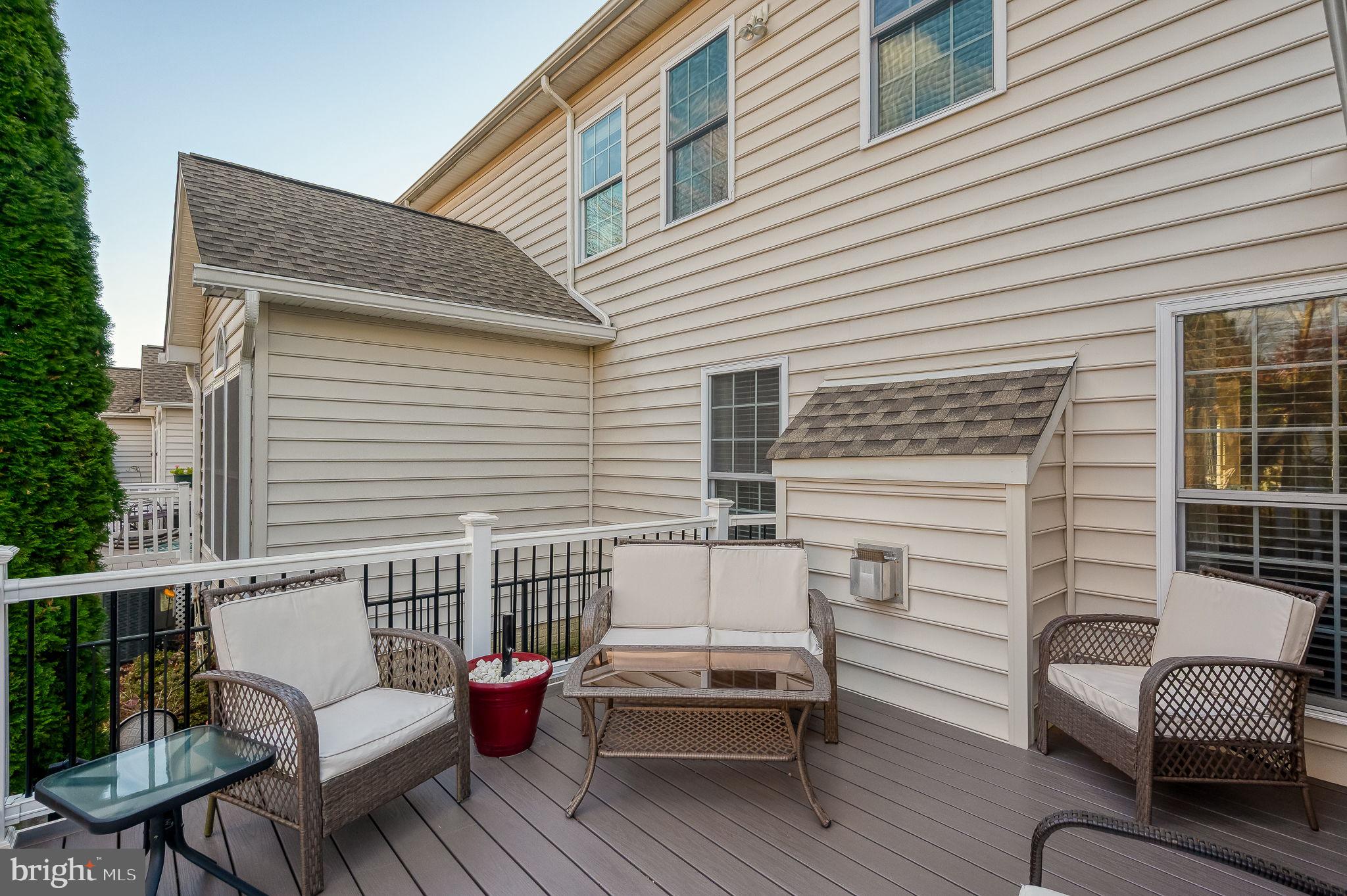 823 Bridle Path Bel Air, MD 21014 - Photo 60 of 66 a view of a patio with couches chairs and wooden floor