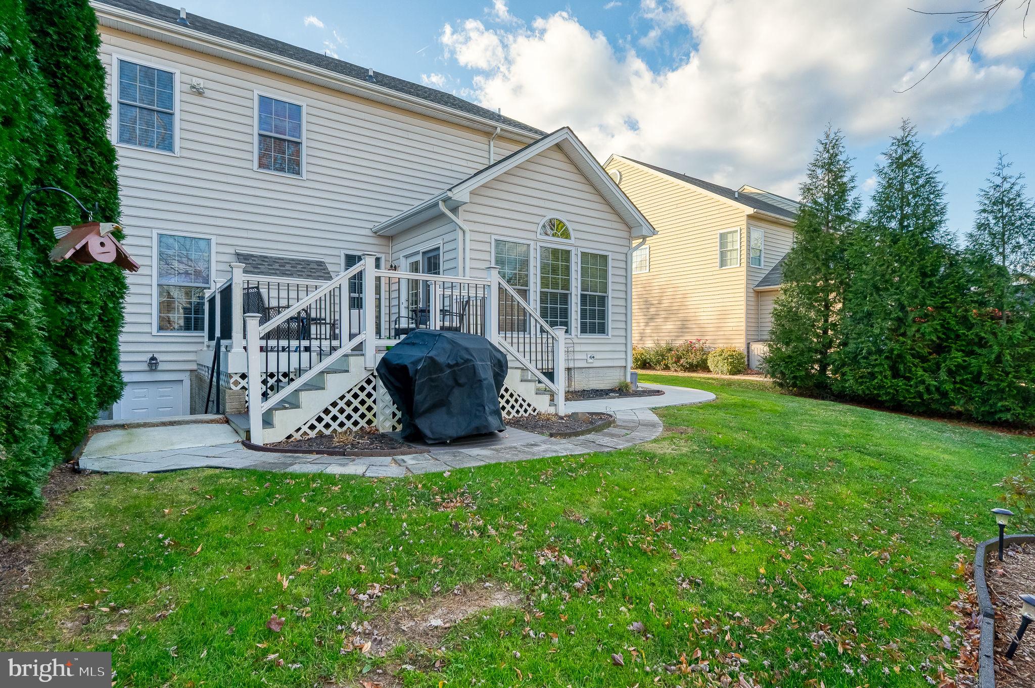 823 Bridle Path Bel Air, MD 21014 - Photo 63 of 66 a view of a chair and table in backyard of the house