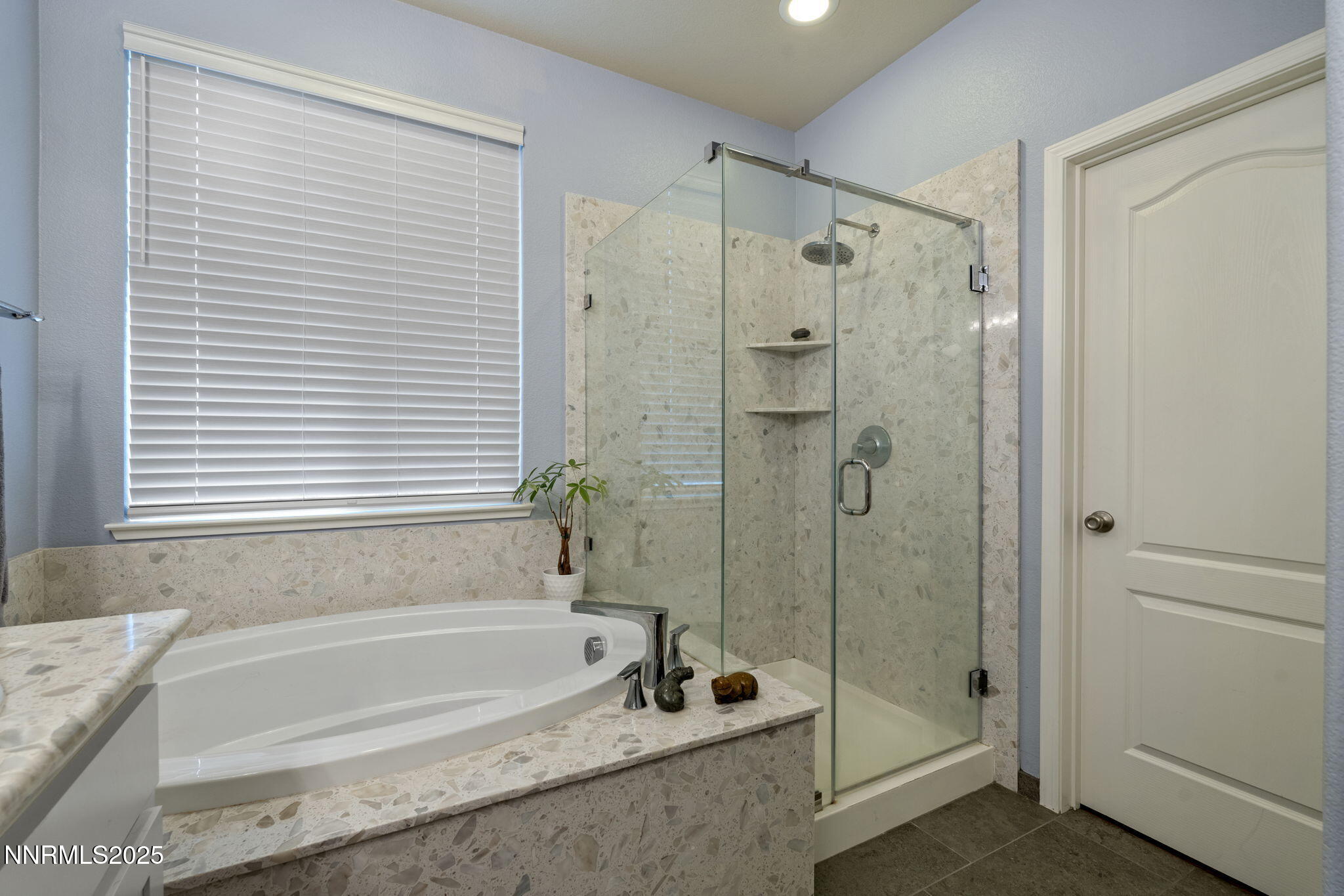2117 Tara Ridge Trail Reno, NV 89523 - Photo 19 of 25 a bathroom with a granite countertop tub shower and sink